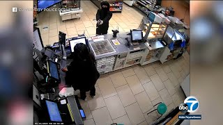 Security video shows armed robbers steal from 7-Eleven cash register in Culver City