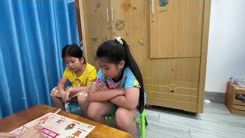 Tiếng Anh Giao Tiếp Trẻ Em Tại Phan Thiết: Kim and Min practice talking about Tet Holiday