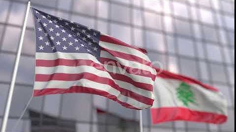 Flags of the USA and Lebanon in Front of a Skyscraper | Motion Graphics - Envato elements
