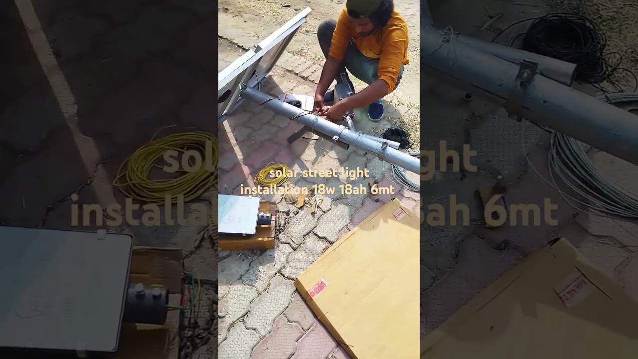 solar street light installation 18w 18ah 60w panal dual mount pole.