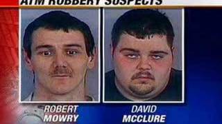 Police Charge Two In ATM Theft; Others Sought