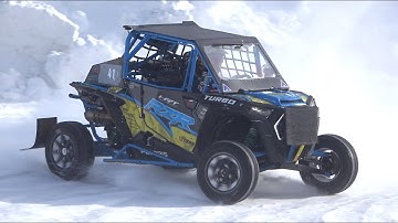 Polaris RZR 1000 Turbo vs Polaris RZR RS1 racing on SNOW! - Side-by-Side UTV at Livigno Ice Track!