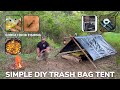 Solo overnight building a diy trash bag tent and raised bed in the woods and lil smokie hobo skillet