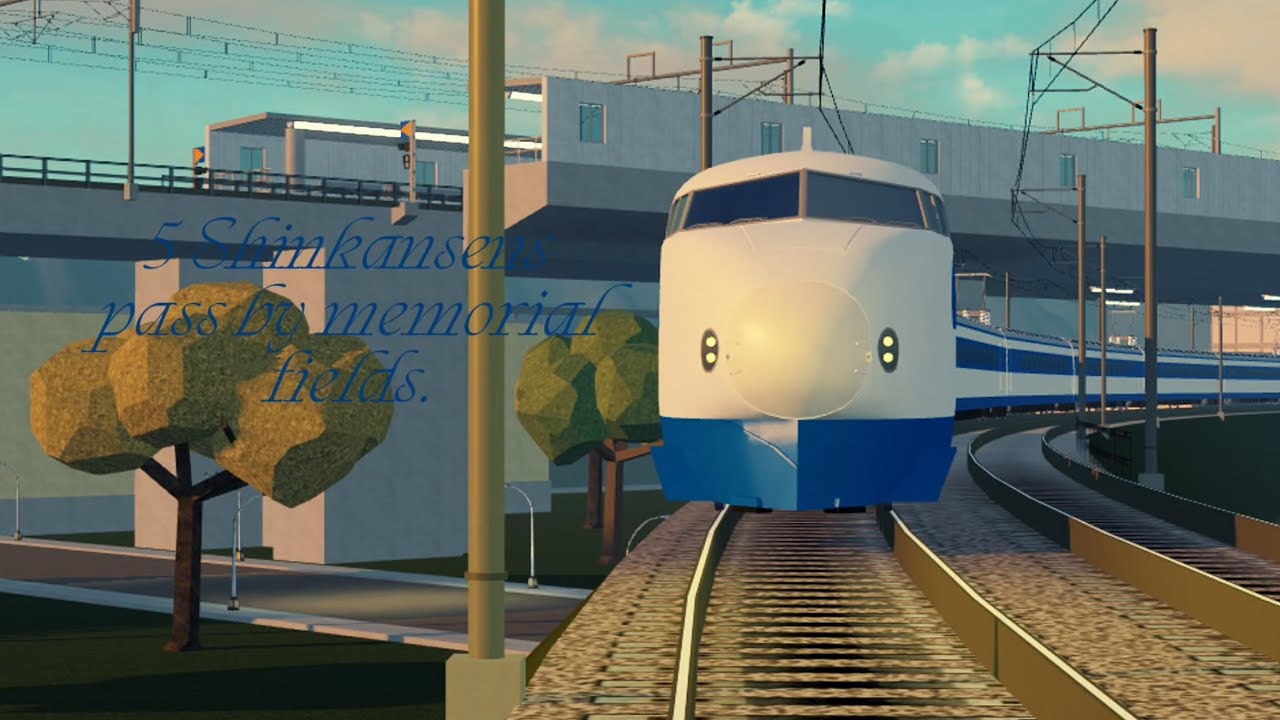 5 Shinkansens pass by memorial fields. (Rails Unlimited.)