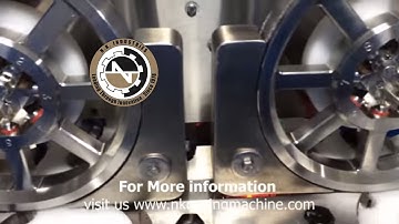 N.K. INDUSTRIES Automatic Double head Injectable dry powder filling machine with rubber stoppering