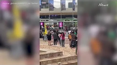 Wild brawl erupts outside Melbourne landmark, injuring two men