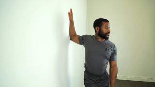 How To Do Bent Arm Wall Stretch | Stretching Demo