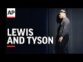 Boxers Lewis and Tyson involved in fight at presser.