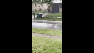 WATCH: Heavy rain flows down Lincoln street