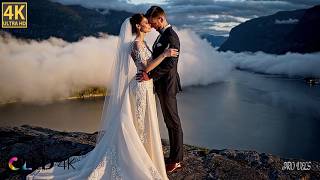 Standing on Trolltunga |Romantic Couple Above the Fjord |Norway Cinematic 4K.Luxurious Couture Dress