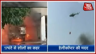 दिल्ली के Malviya Nagar में 17 घंटे से बेकाबू आग; Helicopter बना हवाई दमकल