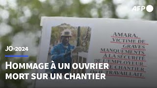 Paris: hommage familial et syndical à l'ouvrier décédé sur un chantier des JO | AFP