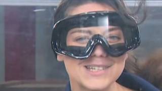 Meteorologist Grace Thornton tests out wind tunnel