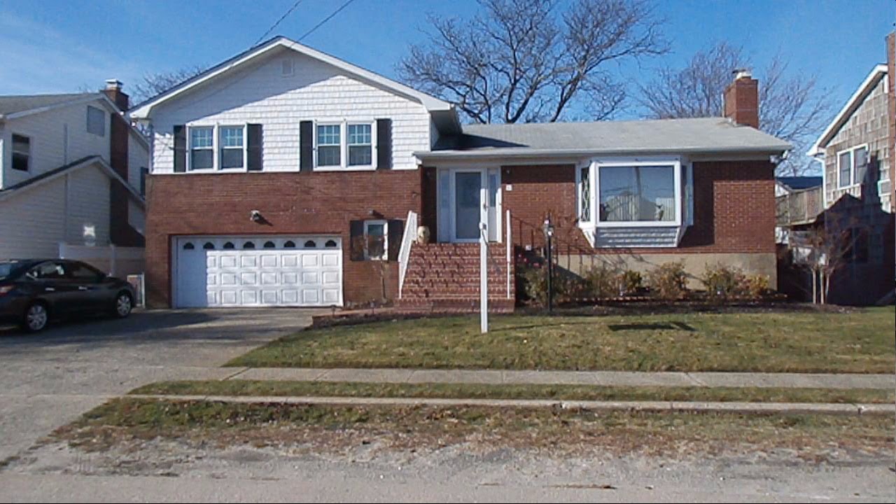 Long Island Point Lookout, NY 11 Mineola Ave. Updated Brick Beach Home