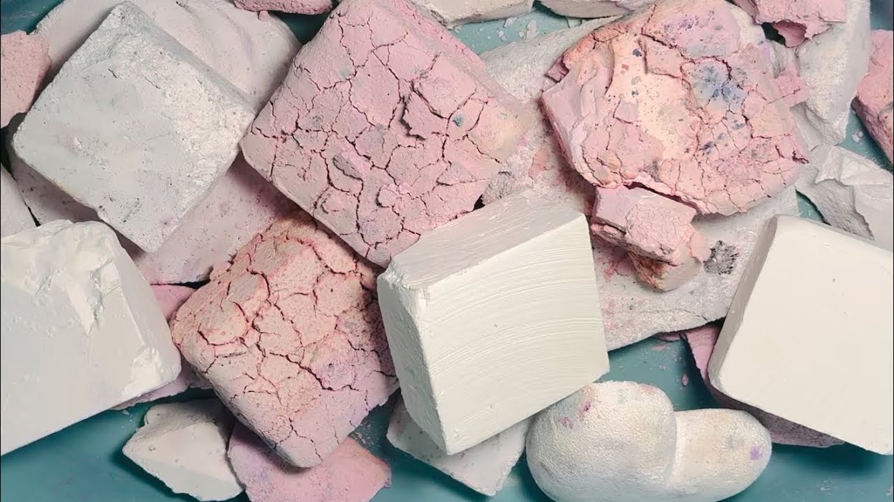Pink pasted gym chalk blocks with white fresh gym chalk blocks and ...