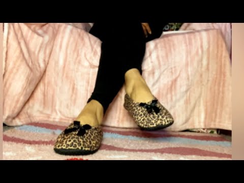 Dangling my foot wearing ballerina slippers