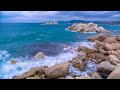 Relaxing waves on a rocky shore of corsica background ocean sounds for yoga meditation exercising