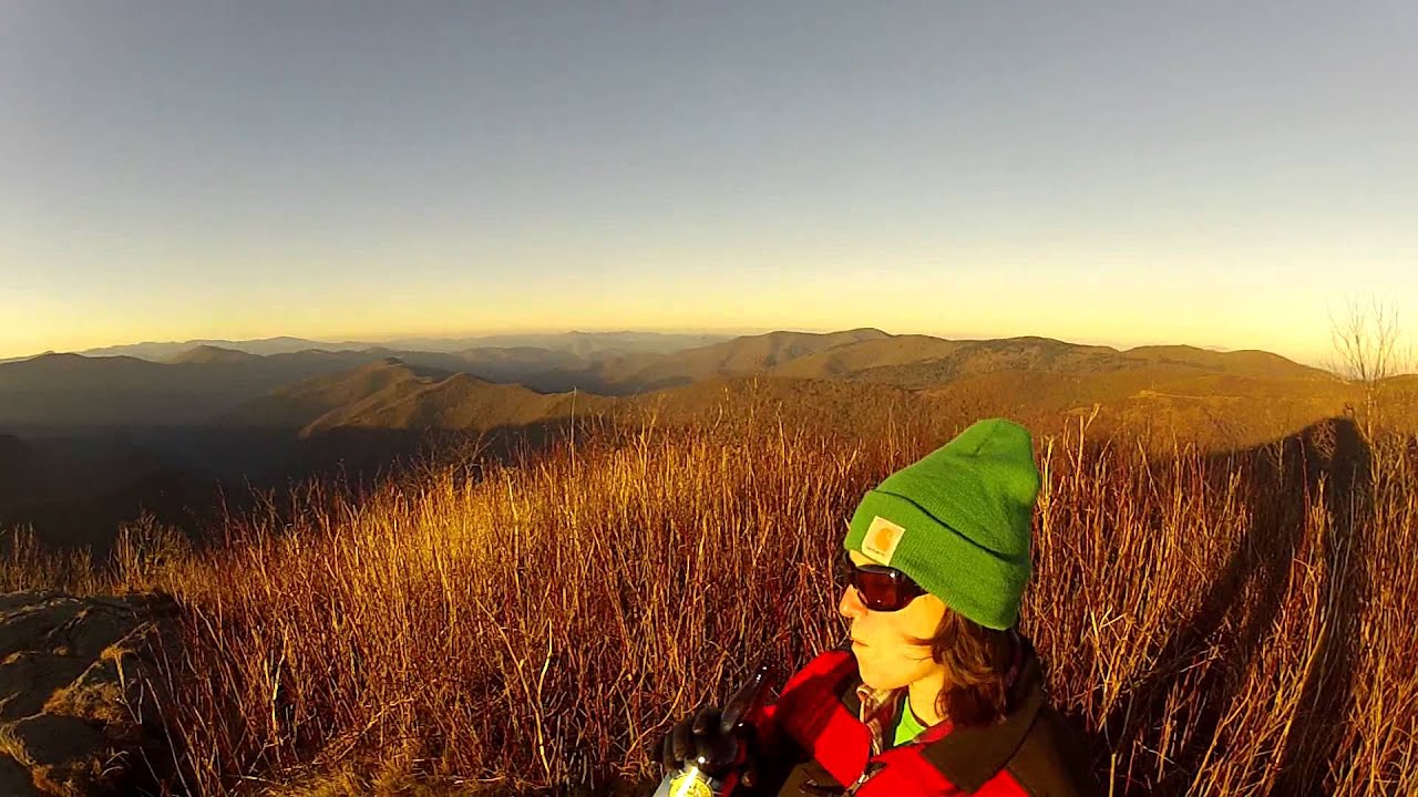 SAM KNOB WINTER HIKE DRINKING COLD MTN WITH COLD MTN IN THE BACKGROUND