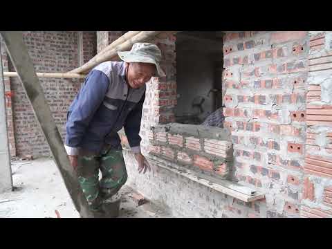 The process of building a Thai roof house: plastering, building walls