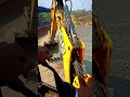 “Powerful JCB Excavator Working on Gravel Site 💪 | Heavy Machine Action Front View Construction Work