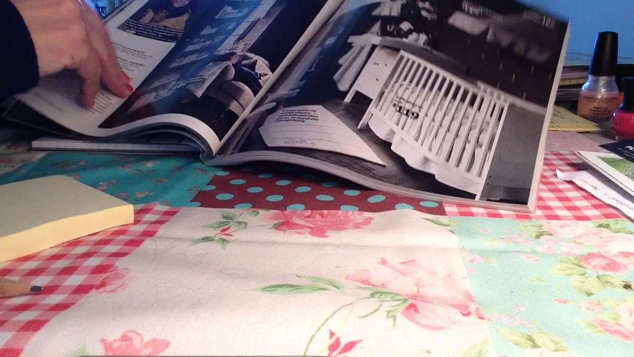 ASMR quiet page flip through IKEA catalog; no talking