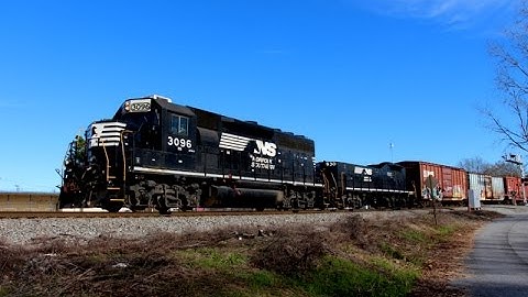 Norfolk Southern GP40-2 3096 with NS RP-E4D Slug 930 leads NS G-68 through downtown Valdosta, GA