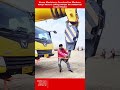 Heavy Machinery Construction Workers Setup Secure Lifting Straps On Industrial Crane Hooks