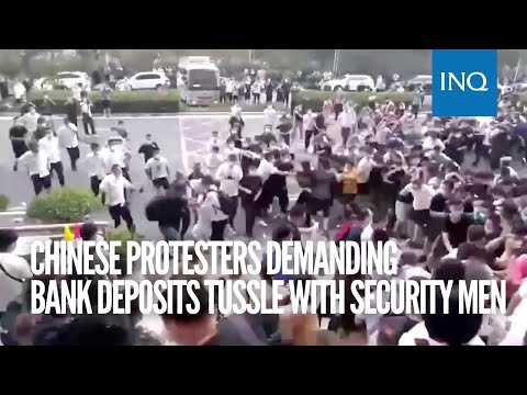 Chinese protesters demanding bank deposits tussle with security men