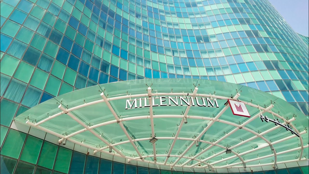 Enjoy the view of curvy glass building, UAE. 🏙️