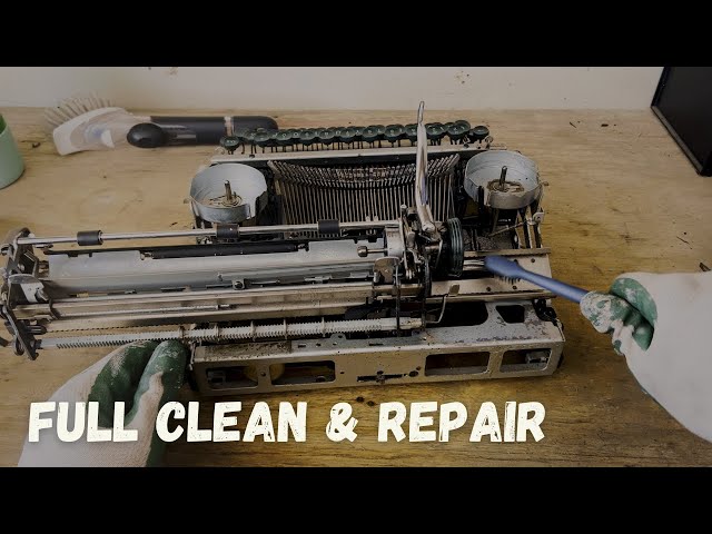 Smith Corona Silent Typewriter Repair - Full clean, fixed broken draw band and shift lock class=