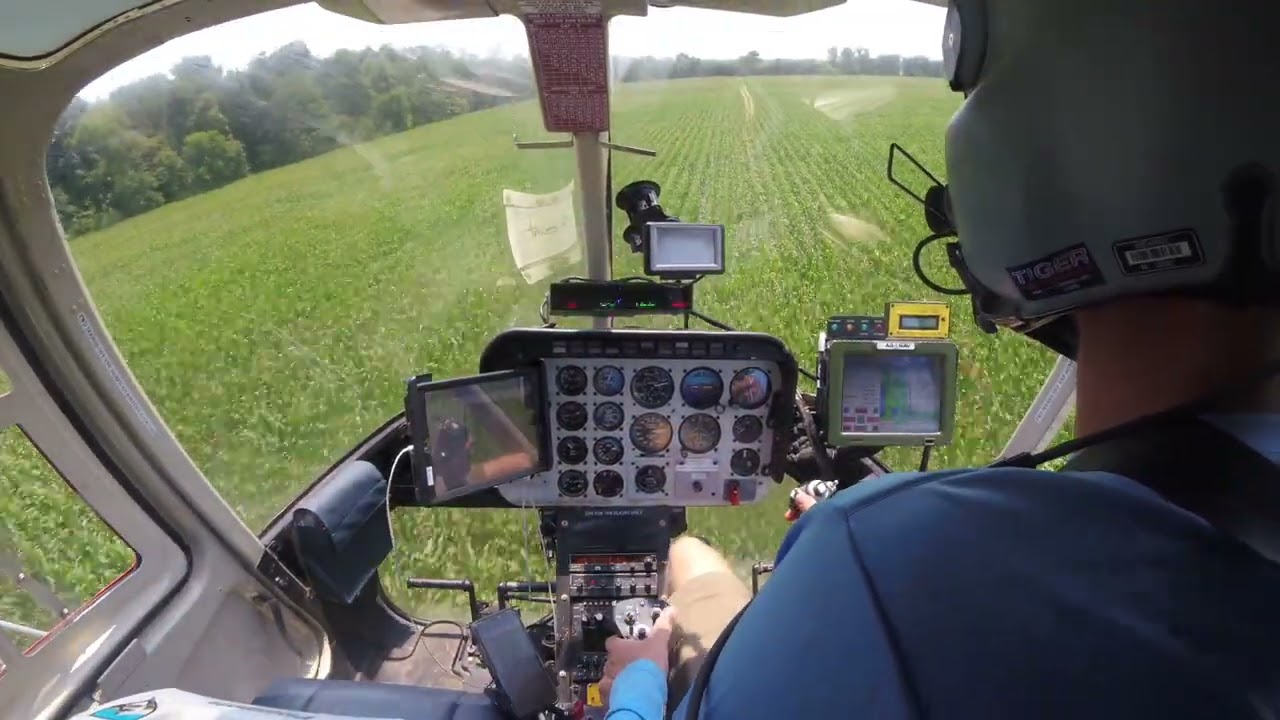 Bell 206 spraying crops
