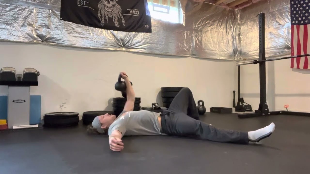 Kettlebell Single Arm Press to Quarter Get Up