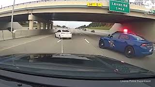 POLICE USE GRAPPLER DEVICE TO STOP STOLEN CAR SUSPECT ON MICHIGAN HIGHWAY