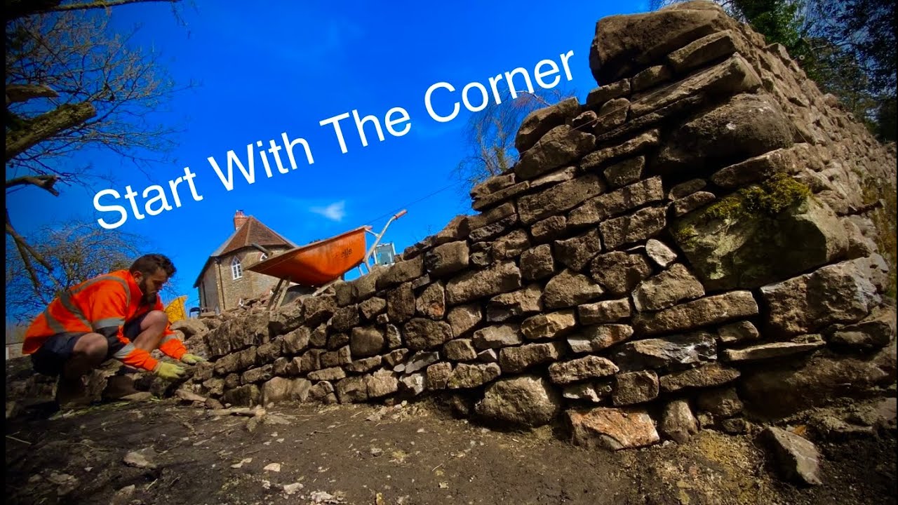 Rough Stone Retaining Wall Build #1 - YouTube