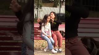 Little Girl Needs Help Tying Her Hair