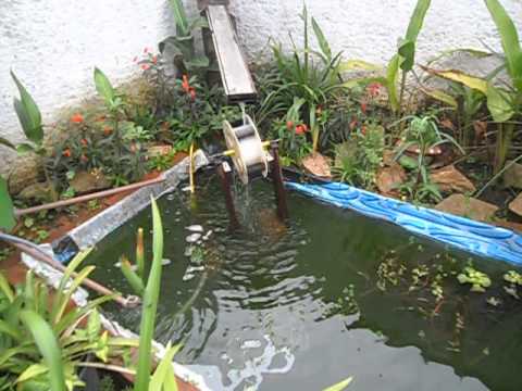 Lago com roda dagua youtube Cascata em lago ornamental