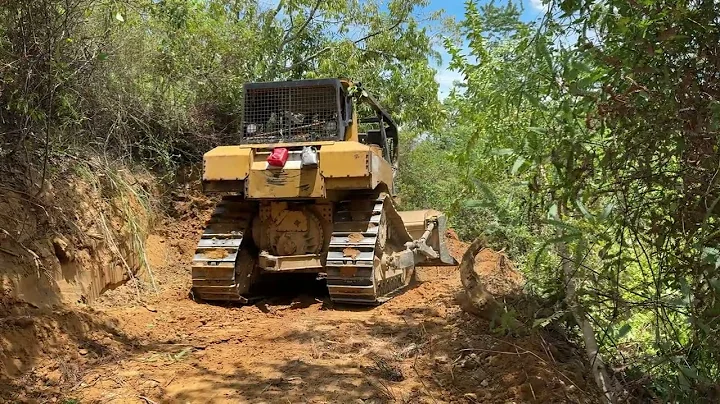 Conquering Steep Cliffs with a D6R XL Bulldozer for a New Road