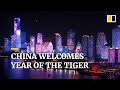 China ushers in Year of the Tiger with lights, parades and traditional Lunar New Year celebrations