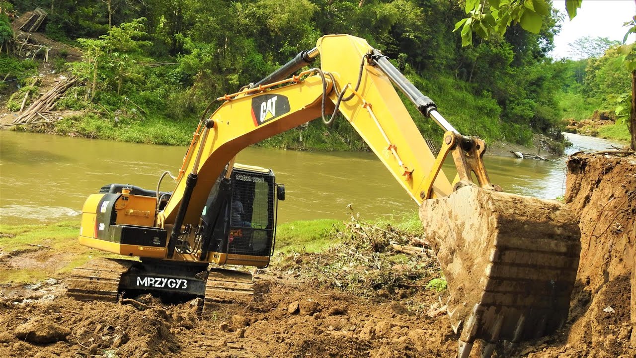 Excavator Making Road Access For The Bridge Construction Preparation ...