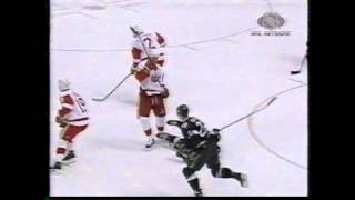 Darren McCarty drills Juha Lind (Game 3 1998 vs Dallas)