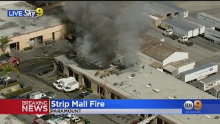 Firefighters Battle Blaze At Paramount Strip Mall