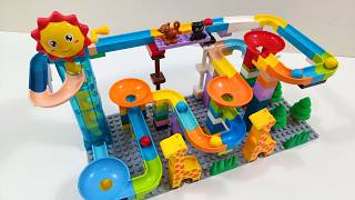 ANIMAL MARBLE RUN! Colorful Marbles Racing Through a Wild Jungle Track