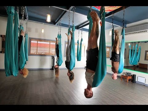 yoga with cloth hanging