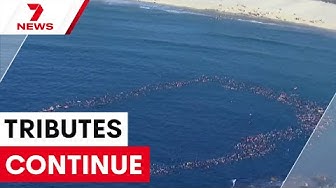 Thumbnail for Paddlers take to Bondi Beach in touching tribute as families continue to mourn loved ones | 7NEWS