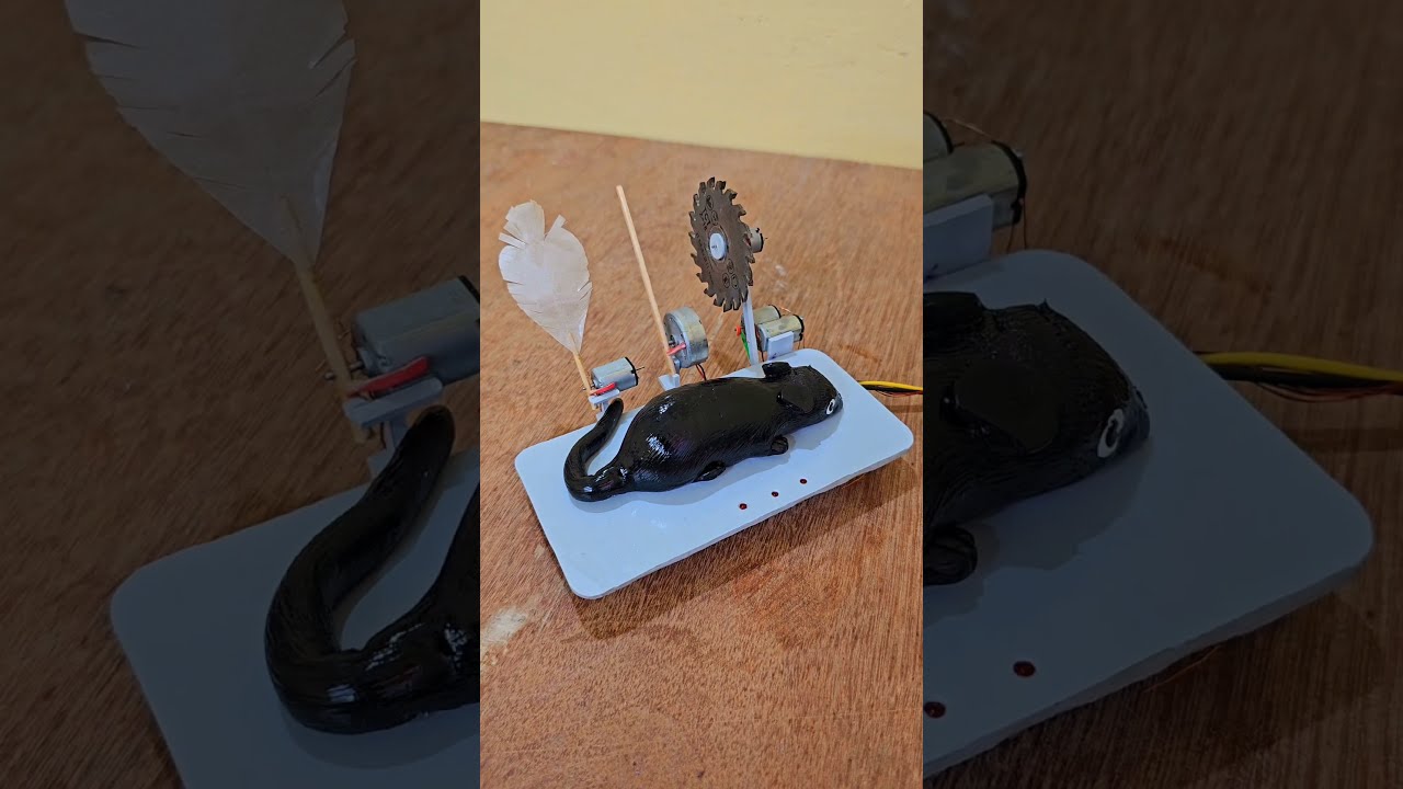 Rubber Mouse Trap With Big Blade Sticks Feather Funny Engineering