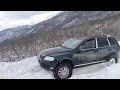 Touareg V8 climbing on very dangerous snow hill