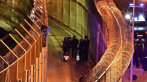 Morocco: Migrants storm border fence into Spain's Ceuta enclave - DayDayNews