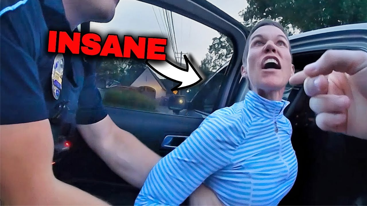 Angry KAREN tries to BITE police officer - YouTube
