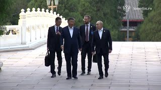 Putin pays his first foreign trip to China after inauguration - What topics were discussed?