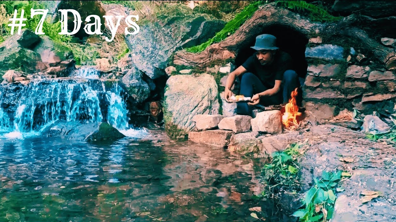 Building a Bushcraft Survival Shelter by the River Side || Catch and ...